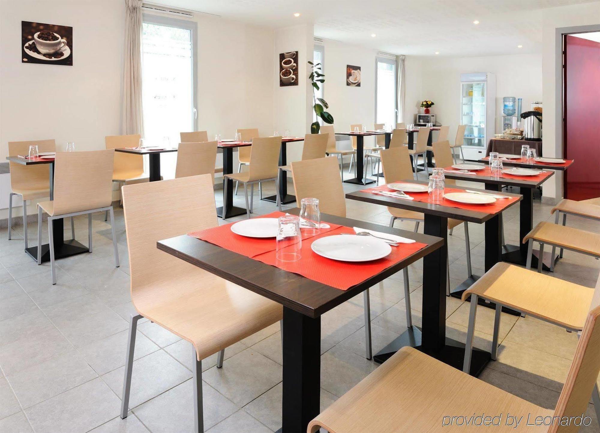 Sejours & Affaires Rennes Villa Camilla Restoran gambar